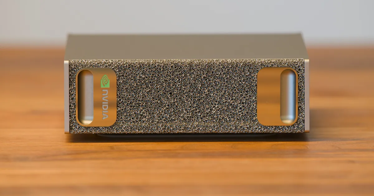 Front of an Nvidia DGX Spark, the small gold box whose GB10 chip is a close relative of RTX Spark