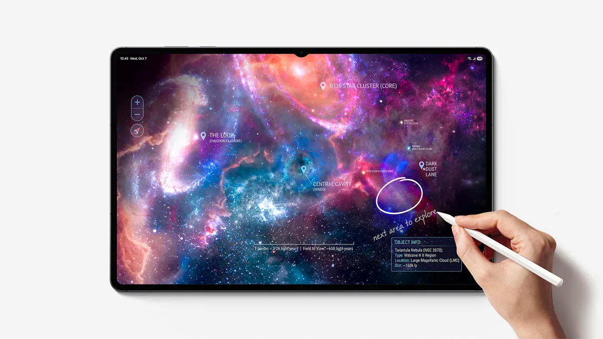 A hand drawing a circle with a white S Pen on a Galaxy Tab S12 tablet showing a labeled map of a nebula