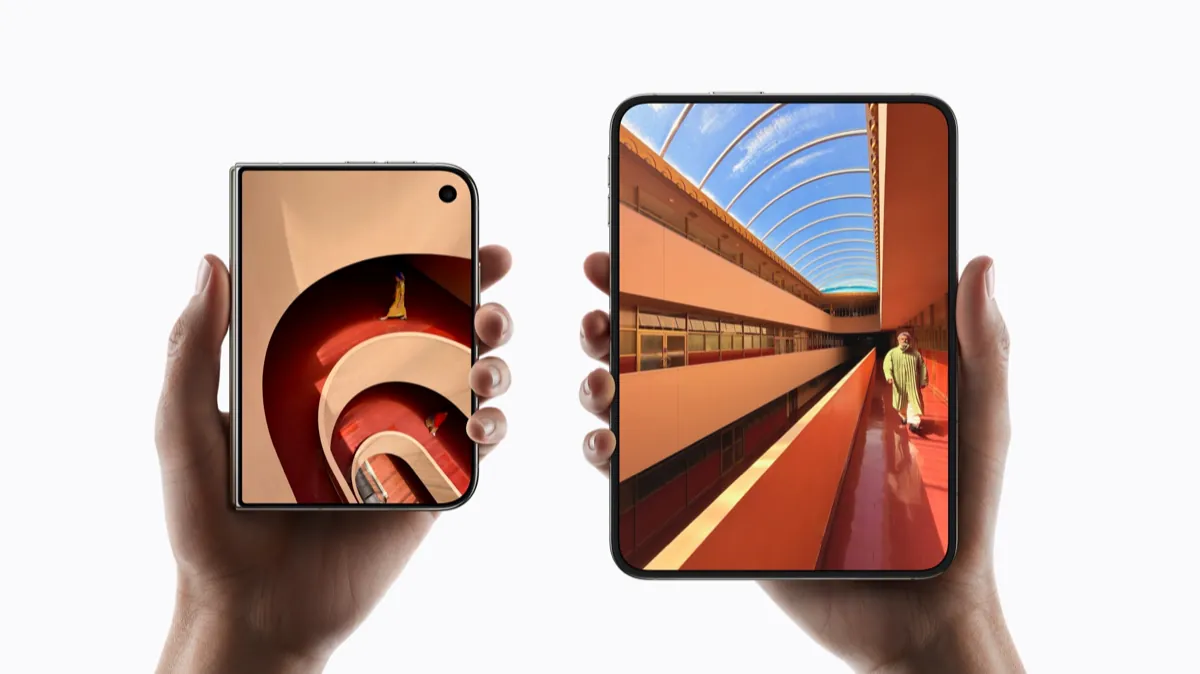 Two hands hold iPhone Duo phones side by side, one folded to show the 5.4-inch outer screen and one open to the 7.6-inch inner screen