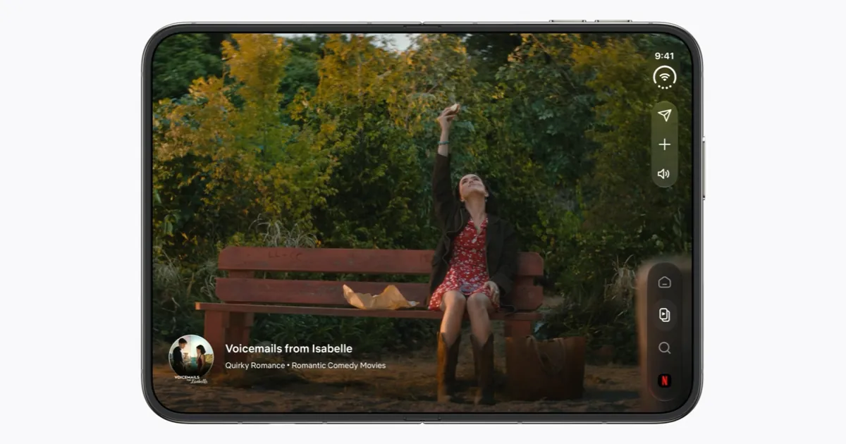 An unfolded iPhone Duo in landscape, its 7.6-inch inner screen playing a Netflix movie edge to edge