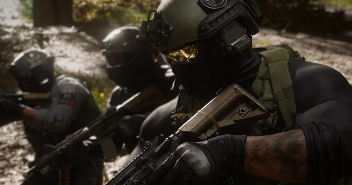 Three armed soldiers in helmets and face masks moving through a sunlit forest in Call of Duty: Modern Warfare 4