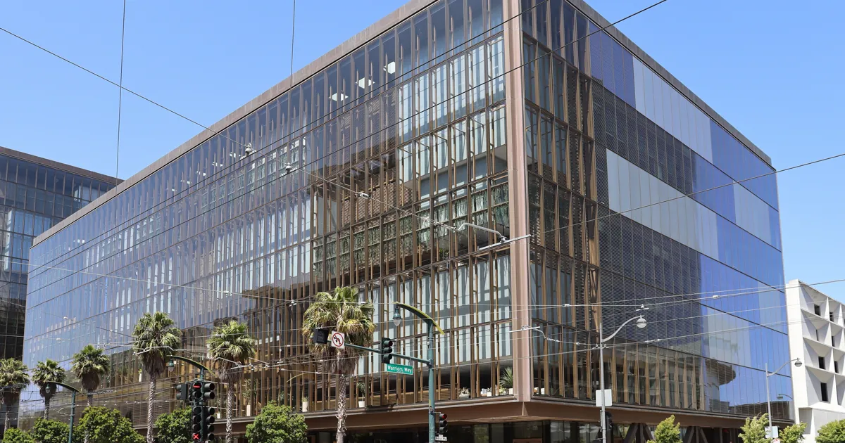 The glass office building at 1515 Third Street in San Francisco's Mission Bay, home to OpenAI's headquarters in 2025