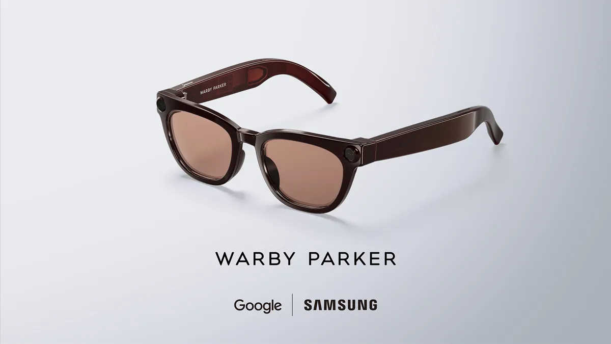 Samsung's brown Warby Parker edition smart glasses with tinted lenses and round fittings at both top corners of the frame