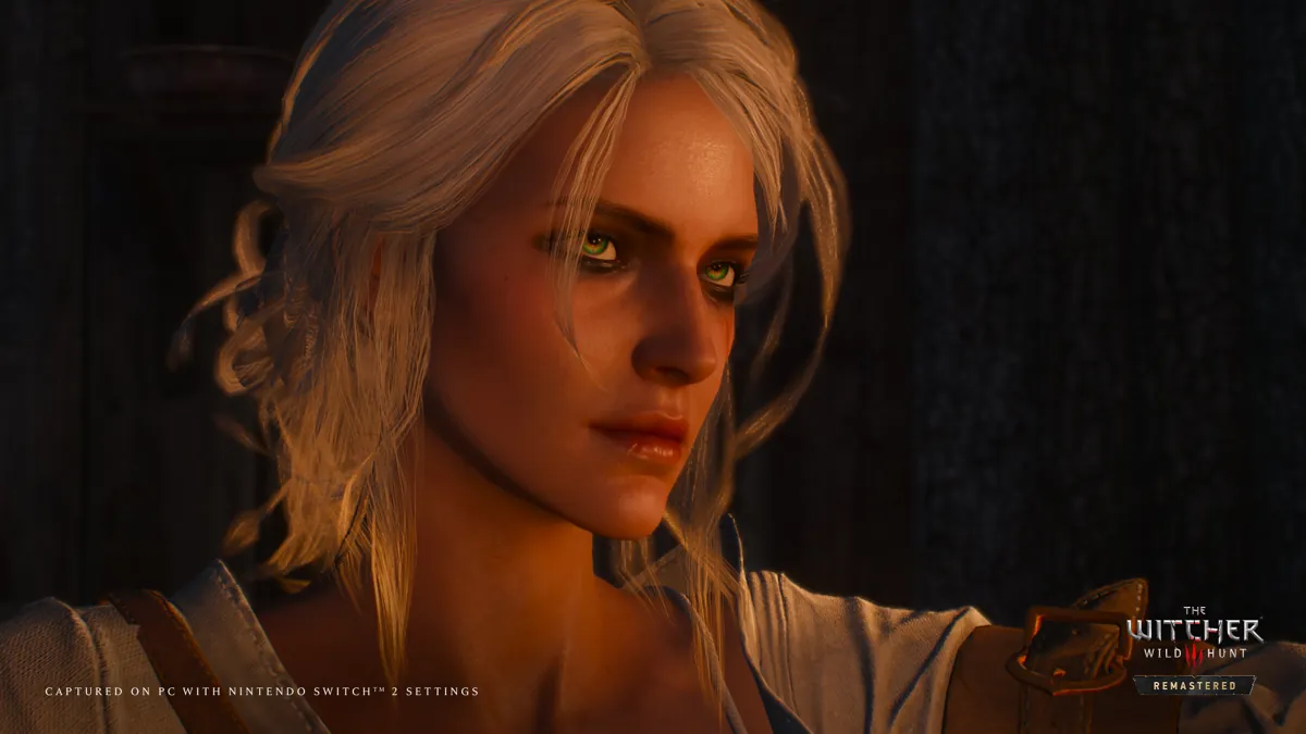 Close-up of Ciri, her white hair lit by warm light against a dark background