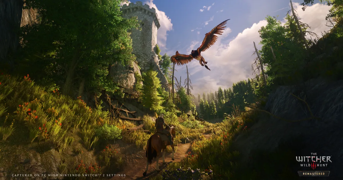 Geralt rides Roach along a sunny forest trail toward a ruined stone tower as a griffin swoops overhead