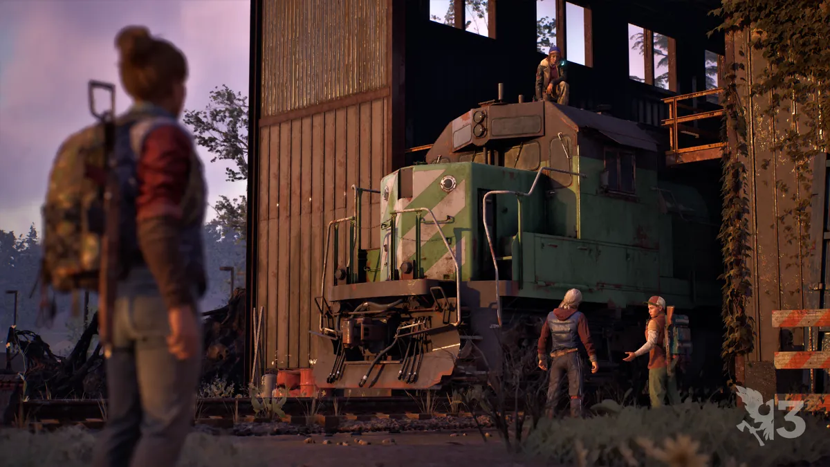 Two survivors in State of Decay 3 talk beside an abandoned green locomotive at dusk while one watches from its roof and another stands in the foreground